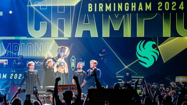 Falcons lifts the ESL One Birmingham trophy after winning the Dota 2 tournament.