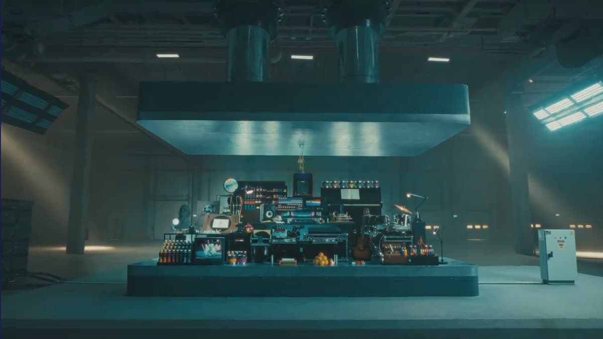 All kinds of creative tools lined up for destruction under a hydraulic press in Apple's iPad Pro advertisement.