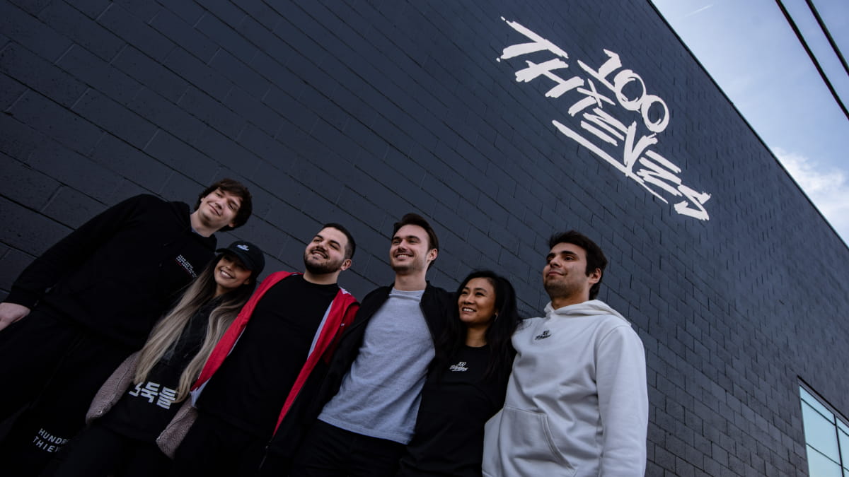 An image of the 100 Thieves team standing outside their compound in Culver City.