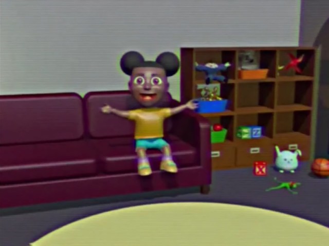 Amanda waving at the camera while sitting on a couch in Amanda the Adventurer 2 demo trailer