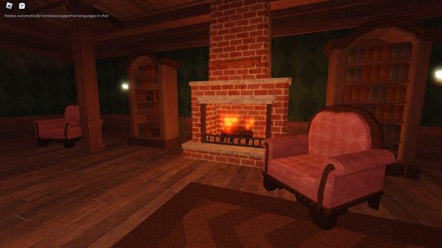 The manor lobby with chair next to lit fireplace in DOORS