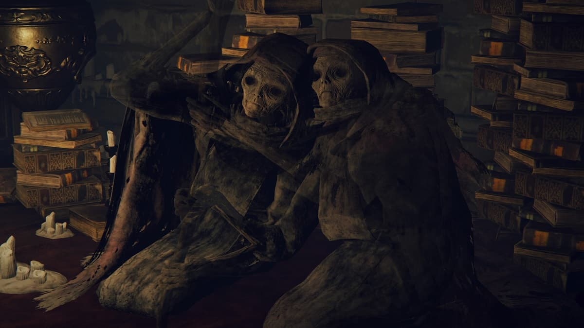 The Twin Maiden Husks sitting together staring at the player character in Elden Ring