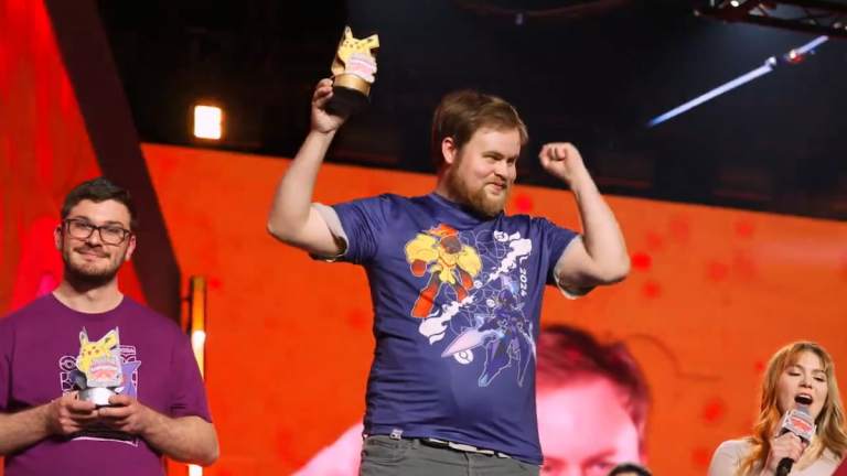 2024 EUIC champ Nils Dunlop celebrating with a trophy in hand.