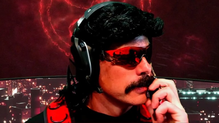 Dr Disrespect talking on his flip phone.