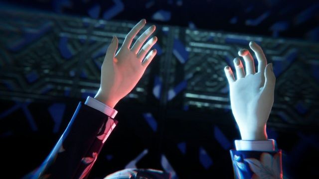 The player character's hands in Shin Megami Tensei V: Vengeance's intro.