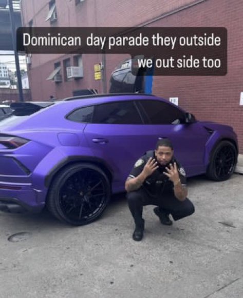 Image of a police officer posing with Fanum's car after it was seized.