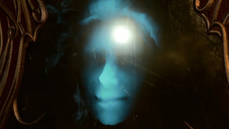 A ghostly, blue, disembodied face is projected in a pitch black magic mirror. Image of the Ornate Mirror from Baldur's Gate 3