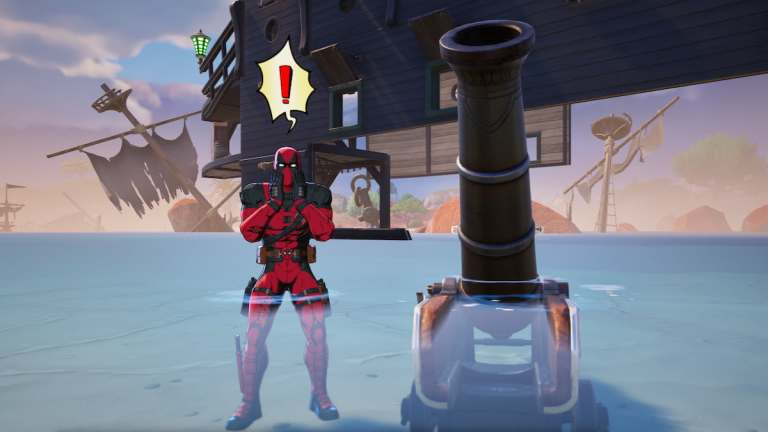 Deadpool standing by a Cannon in Fortnite.