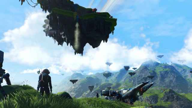 An image from No Man's Sky of the player looking up at a floating planet in a blue sky.