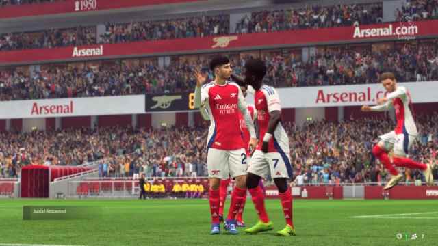 Kai Havertz and Bukayo Saka of Arsenal celebrating scoring a goal in EA FC 25.