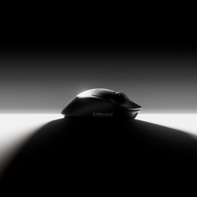 A side view of a black mouse on a dark background.