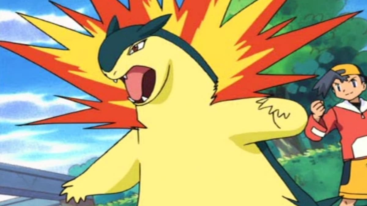 Typhlosion getting ready to battle with the trainer behind him