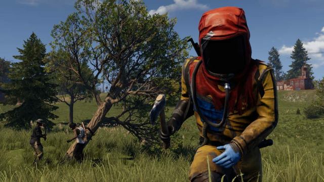 Rust player with a hatchet, wearing a hazmat suit