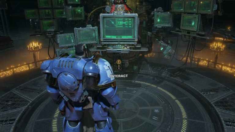 A player in Warhammer 40K Space Marine 2 stood in front of the customization terminal.