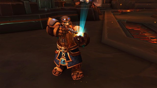 An Earthen dwarf engineer in WoW The War Within using an electronic tool to tinker with a contraption, which is emitting light