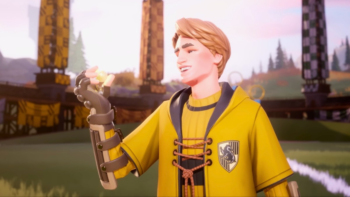 Cedric Diggory wearing Hufflepuff clothing holding a snitch in quidditch champions