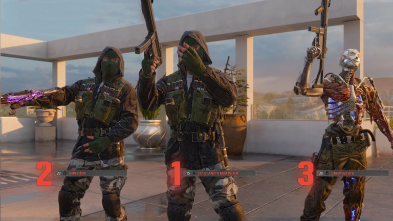 Three CoD players stand together holding weapons in the Winner's Circle in Black Ops 6.