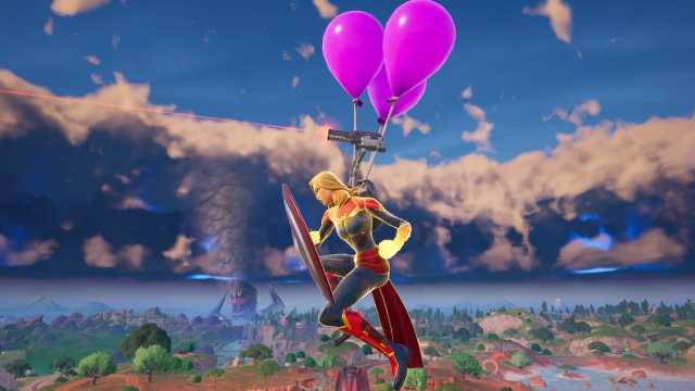 Captain Marvel flying with Birthday Balloons in Fortnite.