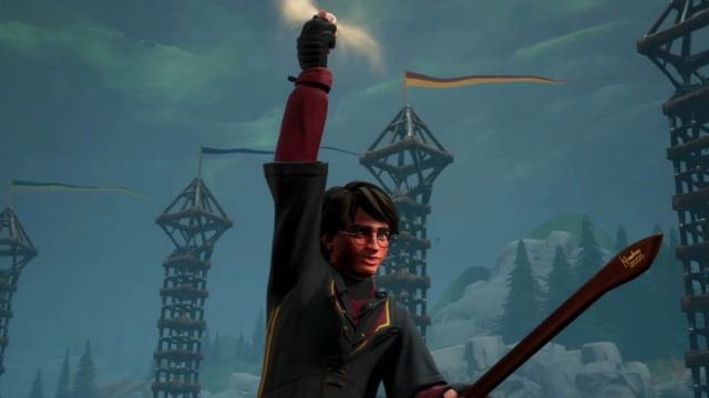 Harry Potter holding the Snitch in Harry Potter Quidditch Champions.