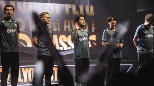 FlyQuest's LoL team stands side by side on stage during the LCS 2024 Summer Championship opening ceremony.