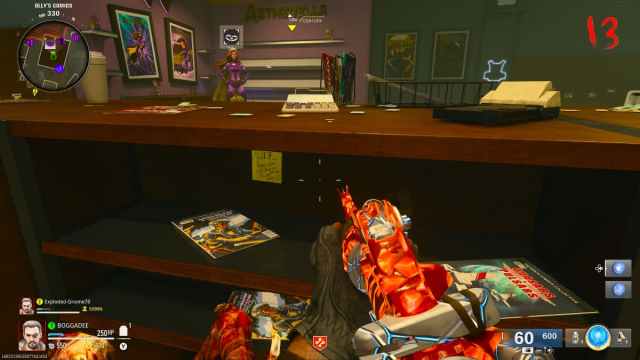 A player crouching behind a desk in Olly's Comics in the Liberty Falls map in Black Ops 6.