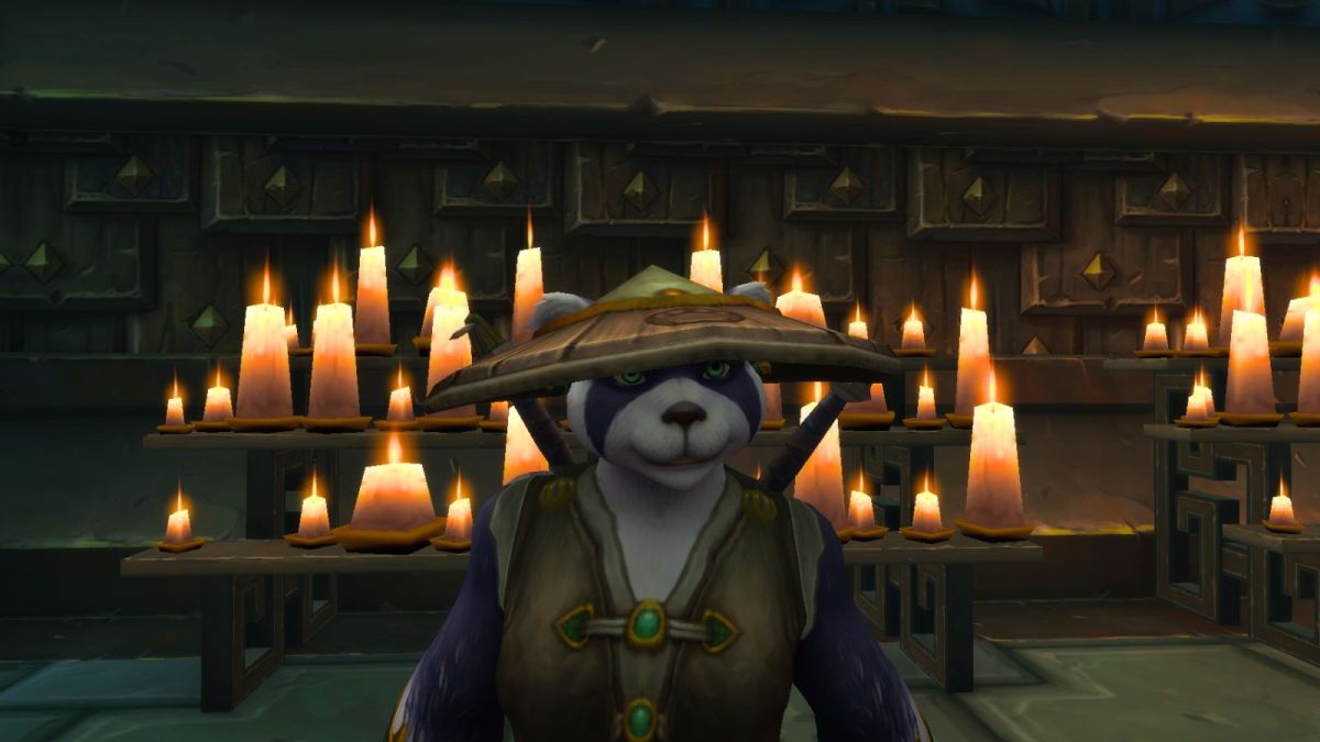 Pandaren Monk with candles behind her in World of Warcraft.