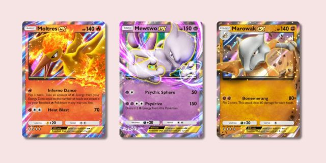 Moltres ex, Mewtwo ex, and Marowak ex Pokémon cards.