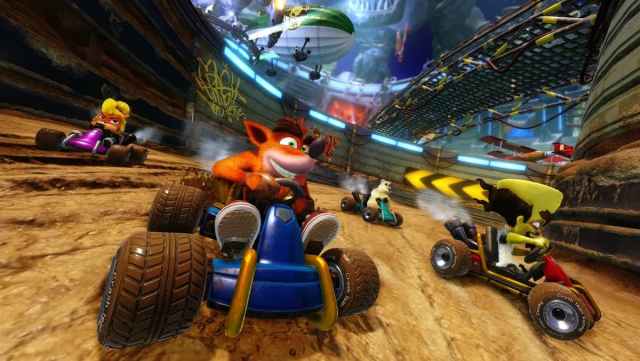 Crash Bandicoot and other characters racing in miniature cars.