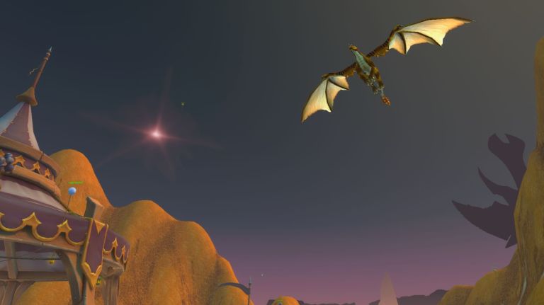 World of Warcraft 20th Anniversary tent in Tanaris with balloons, the sun, and a dragon.