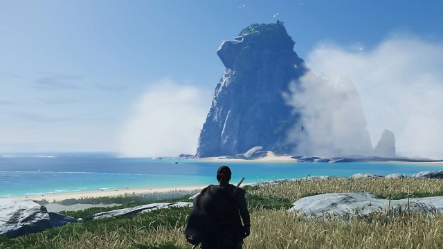 A man staring at a tall mountain against a blue sky in Ghost of Tsushima