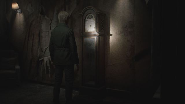 James looking at the Grandfather Clock in the Bluecreek Apartments