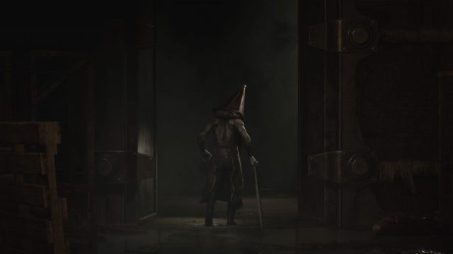 Pyramid Head leaving the S Room after the boss fight in Bluecreek Apartments