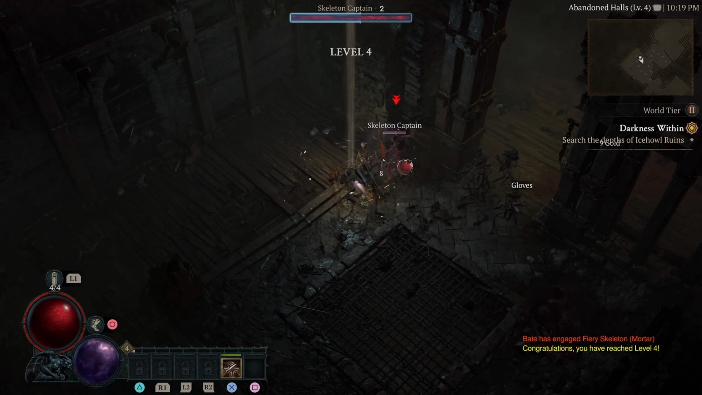 A rogue reaching level 4 in Diablo 4 as they fight skeletons in a dark hall.