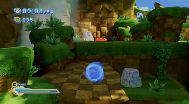 sonic spindashing towards a couple of rocks in green hill zone underground