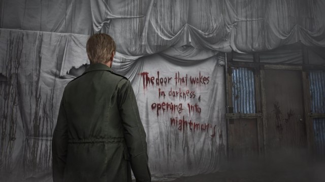 James Sunderland looking at a message written in blood on the wall