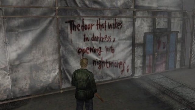 James Sunderland standing in front of a message written in blood on the wall