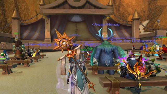 Story Time event in World of Warcraft's 20th anniversary event with benches and a stage.