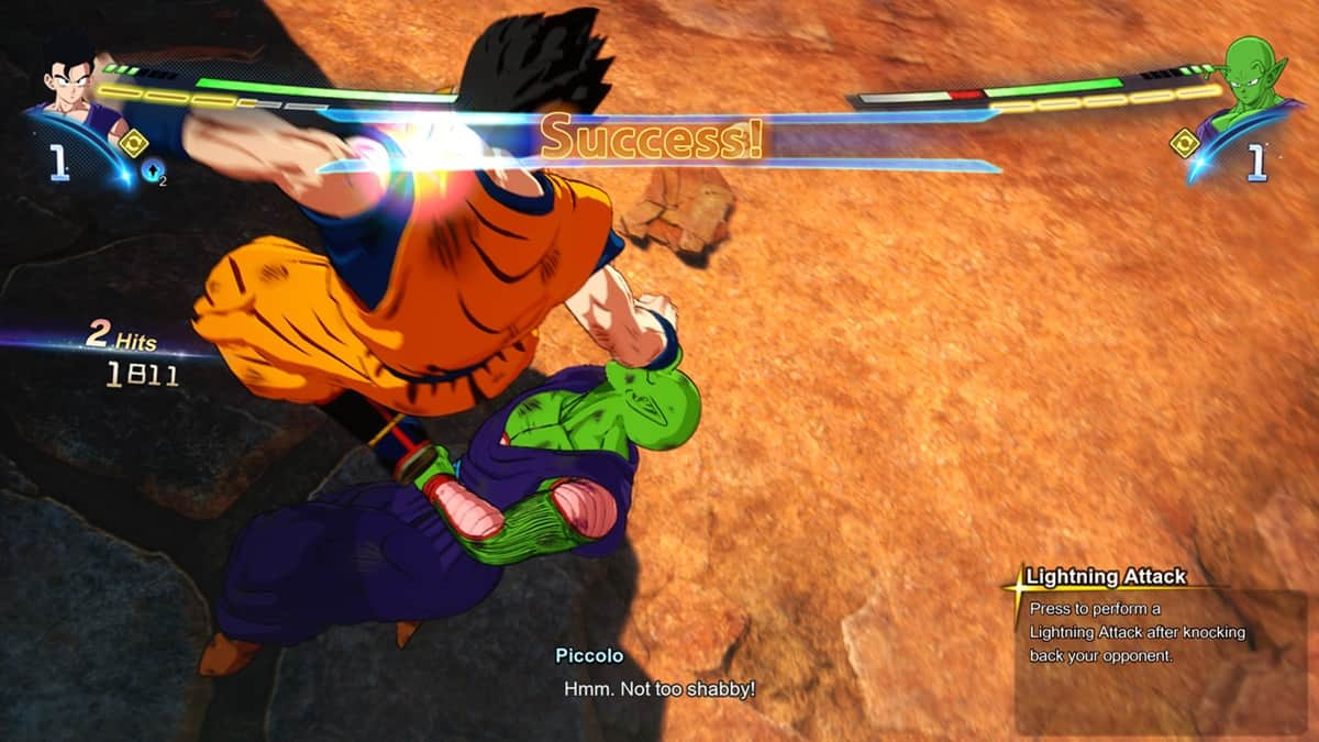 Gohan in the midst of using a Lightning Attack move against Piccolo in a desert with rocks in the background