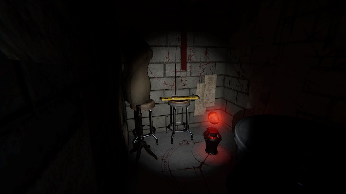 A Totem sitting on the ground in the corner of a basement hallway in Phasmophobia. 