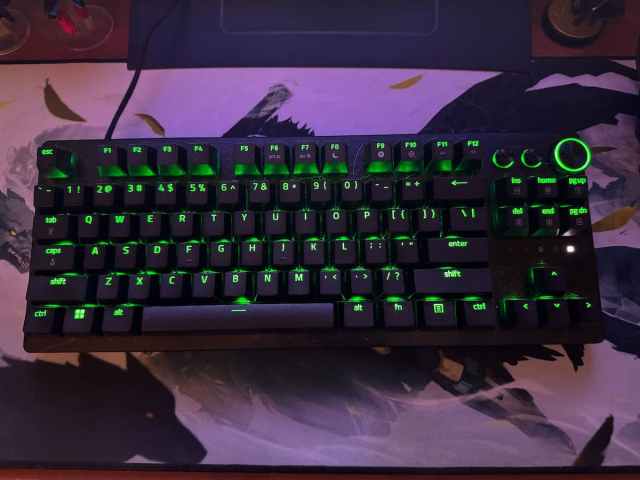 A photo of the Razer Huntsman V3 Pro keyboard on the reviewer's desk.