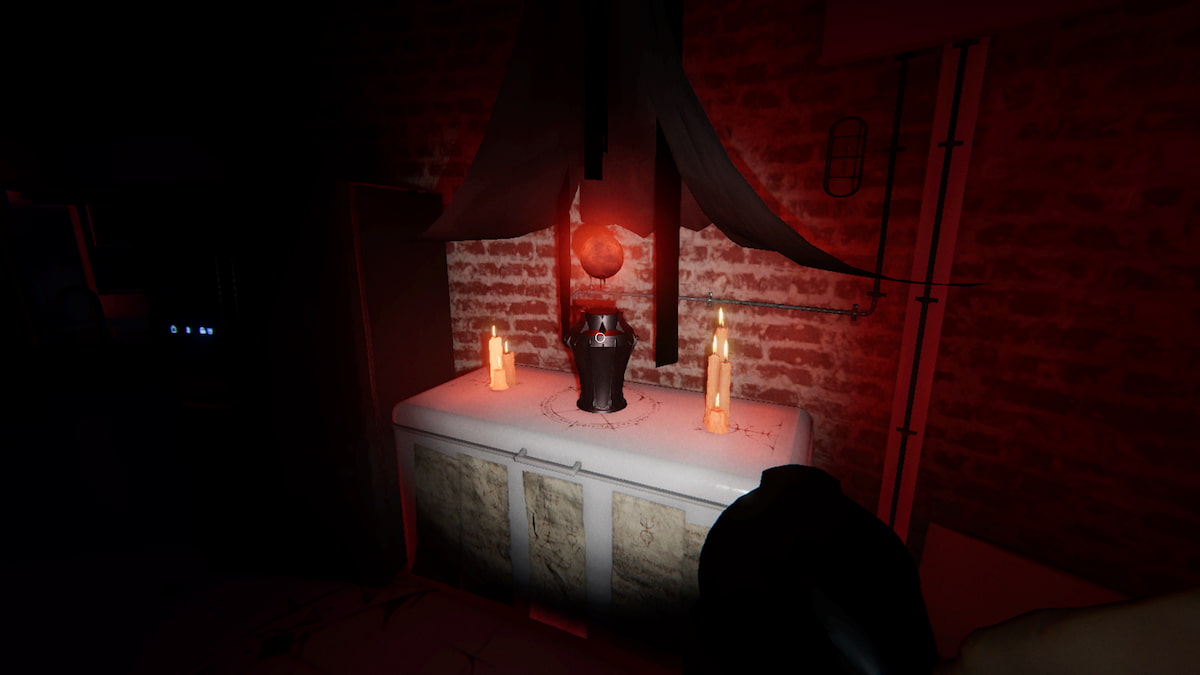 A Totem on the second floor of Point Hope sitting on a freezer in the kitchen in Phasmophobia.