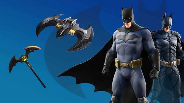 Batman showing his suit with the Batman Pickaxe by his side.