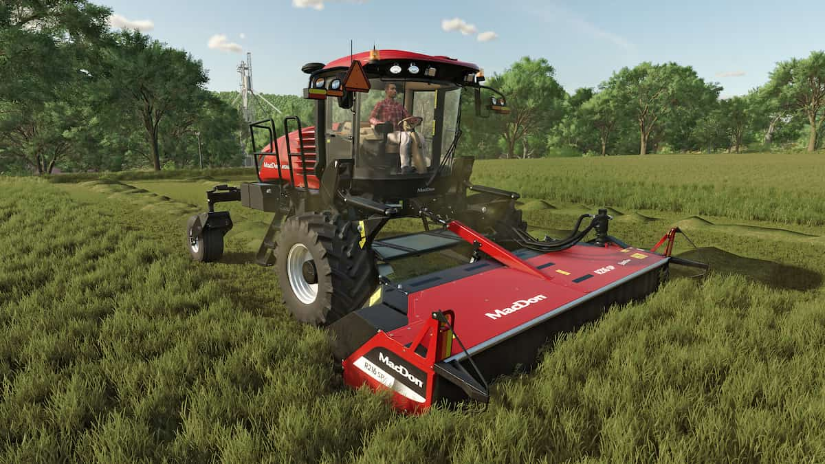 An image of a red MacDon tractor in Farming Simulator 25, which is used to clean up your fields.