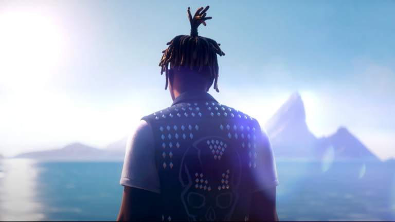 A shot from behind of Juice WRLD in Fortnite, looking over the sea.