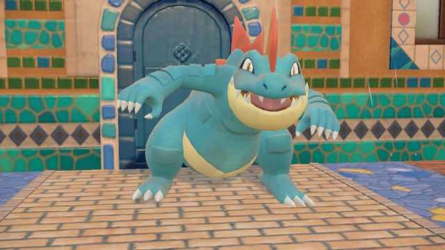 Feraligatr standing on tiles in Pokémon Scarlet and Violet.