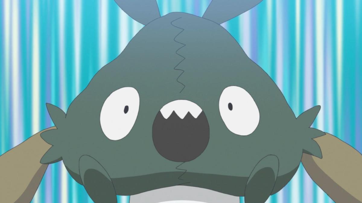 Trubbish Pokémon from the anime with a stripy background.