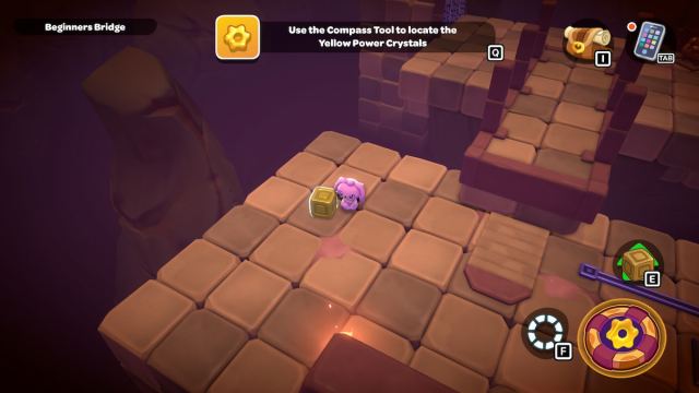A pink bunny character standing by a yellow block in a puzzle room in Hello Kitty Island Adventure.