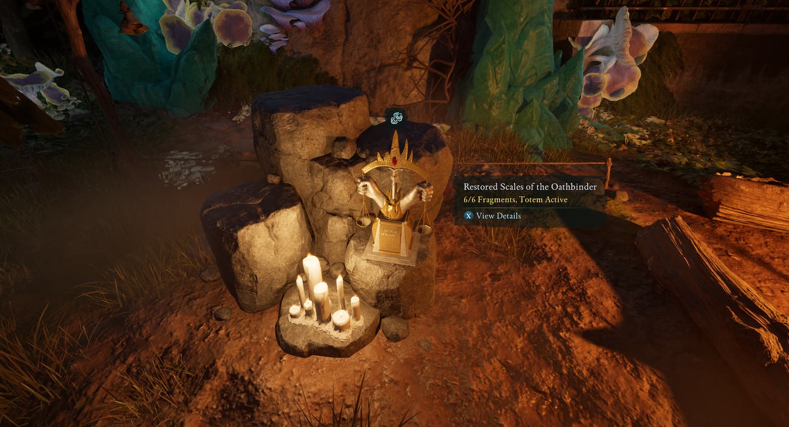 A screenshot from Avowed, showing the Restored Scales of the Oathbinder, a golden statue sitting atop a pile of rocks. C