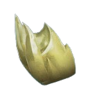 A golden tooth-looking item from Avowed. This is the Golden Flame Totem Fragment