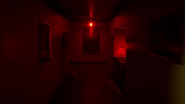 Red corridor of the IN THE FACADE WE TRUST chase sequence against the creature